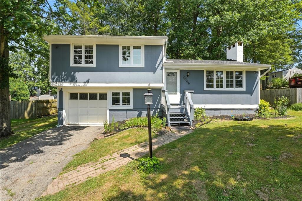 2066 Powell Road Cranberry Township, PA 16066 - Photo 44 of 44 a view of house with a yard
