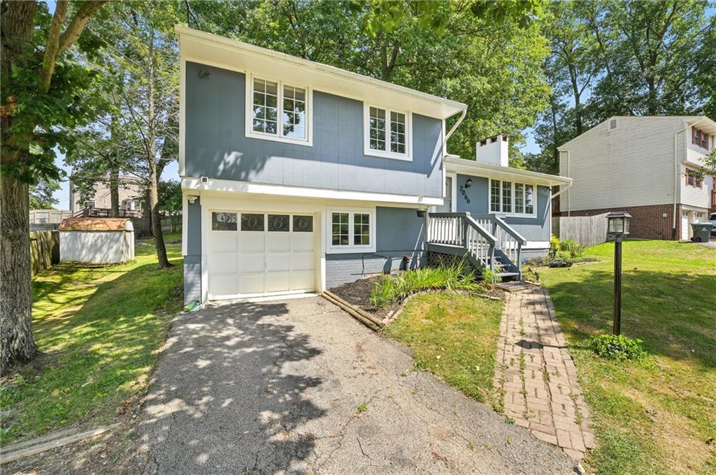 2066 Powell Road Cranberry Township, PA 16066 - Photo 5 of 44 a view of a house with a yard