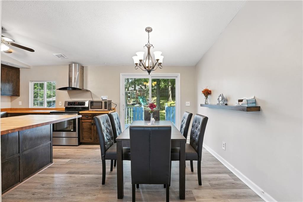 2066 Powell Road Cranberry Township, PA 16066 - Photo 10 of 44 a view of a dining room with furniture window and outside view