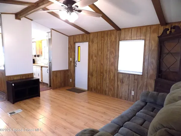 a bed room with a bed and a couch
