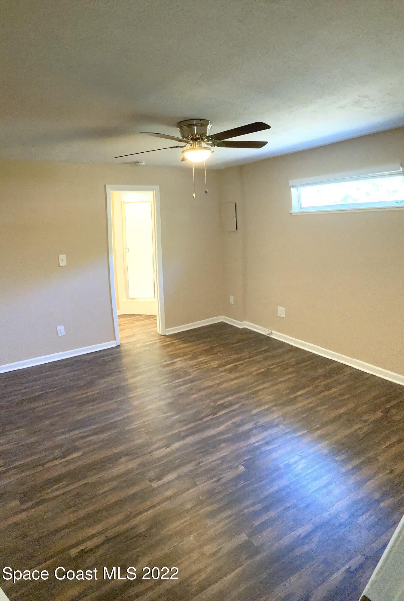 1153 Martha Lee Avenue Rockledge, FL 32955 - Photo 8 of 12 Mstr Bedroom