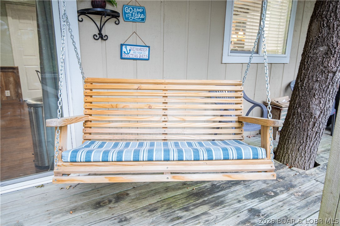 258 Northview Road Sunrise Beach, MO 65079 - Photo 28 of 35 Porch Swing