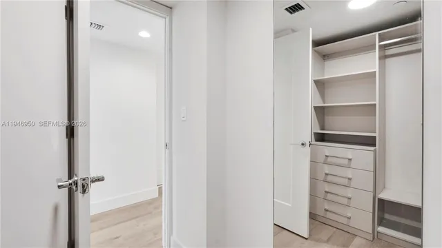 a view of a walk in closet