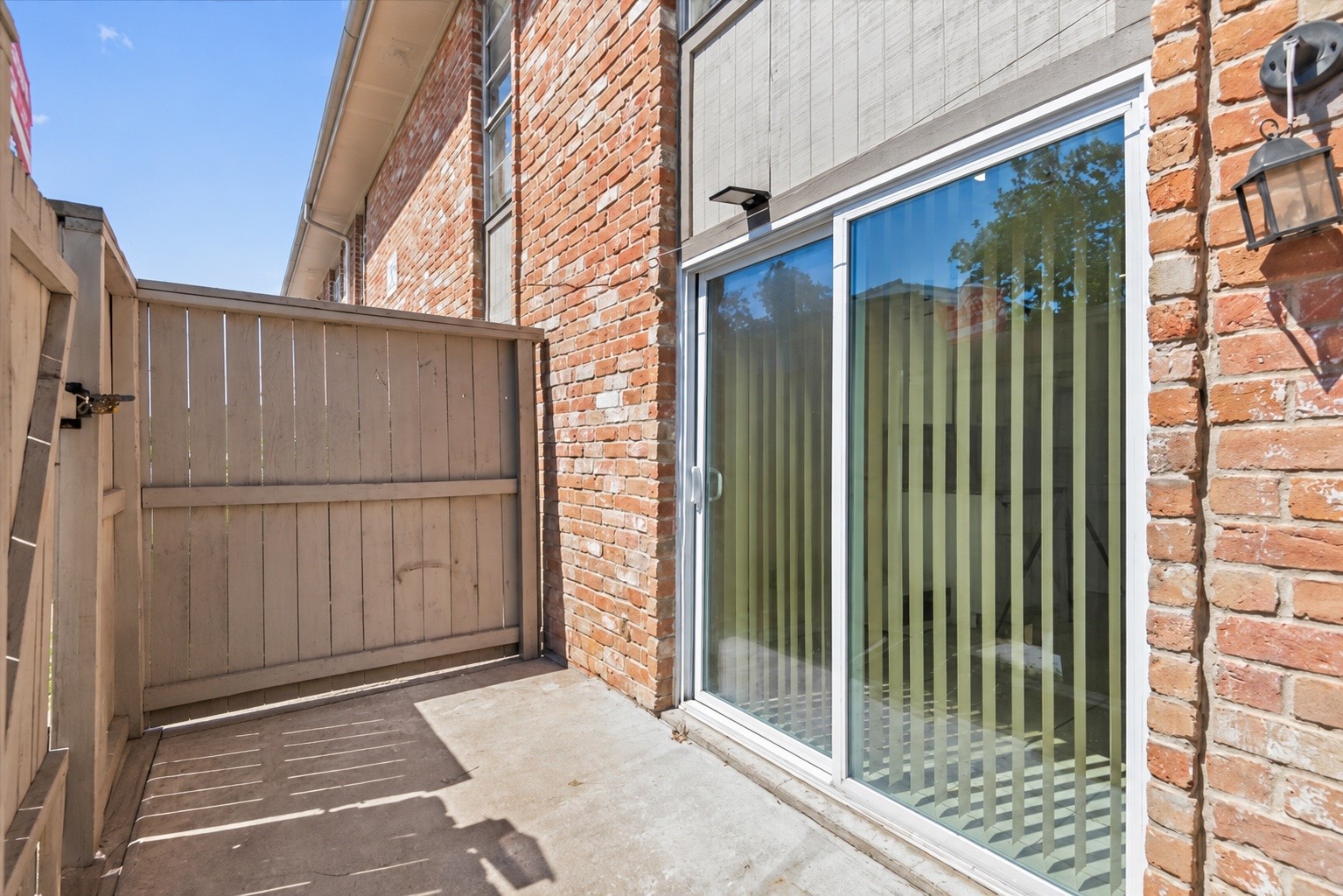 9616 Long Point Road, Unit 63 Houston, TX 77055 - Photo 17 of 17 Private patio creates the perfect outdoor extension for relaxing or entertaining.