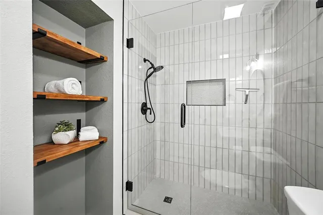 a bathroom with a sink and a shower