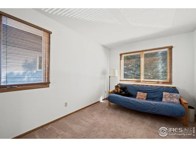 a bathroom with a sink toilet a mirror and vanity