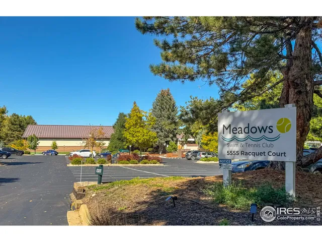 a view of a city with mountains in the background