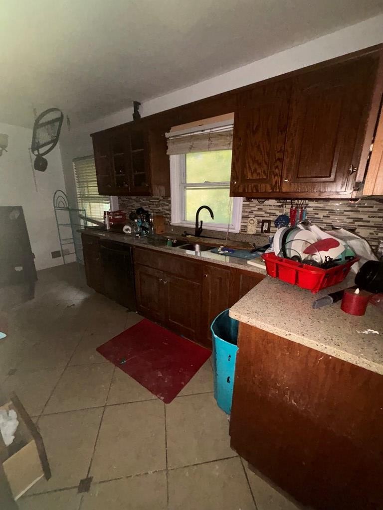 3909 Commander Drive Columbus, GA 31903 - Photo 11 of 21 a kitchen with a stove a microwave and cabinets