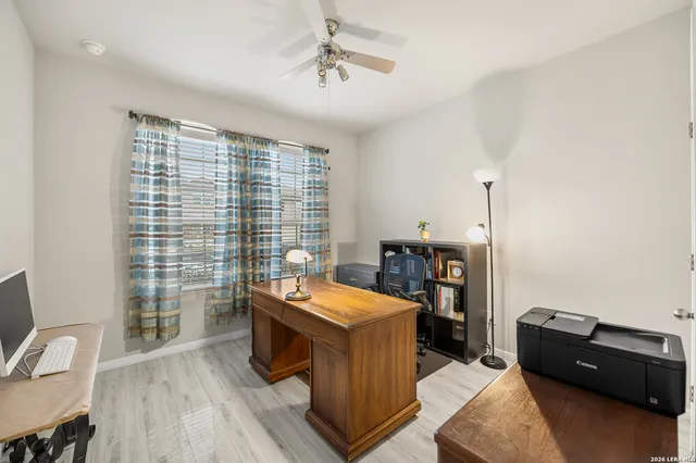 a room with furniture and a window