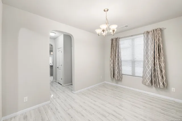 a view of livingroom with hardwood floor and window