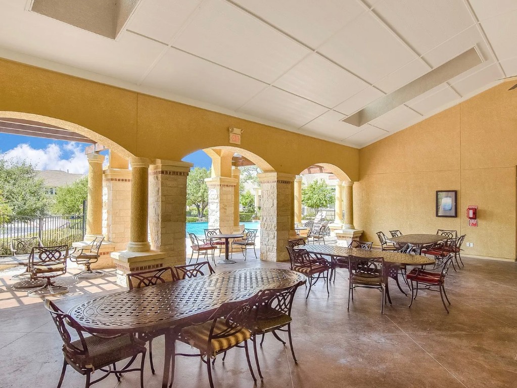 106 Evolutions Path Austin, TX 78738 - Photo 21 of 24 a view of a dining room with furniture window and outside view