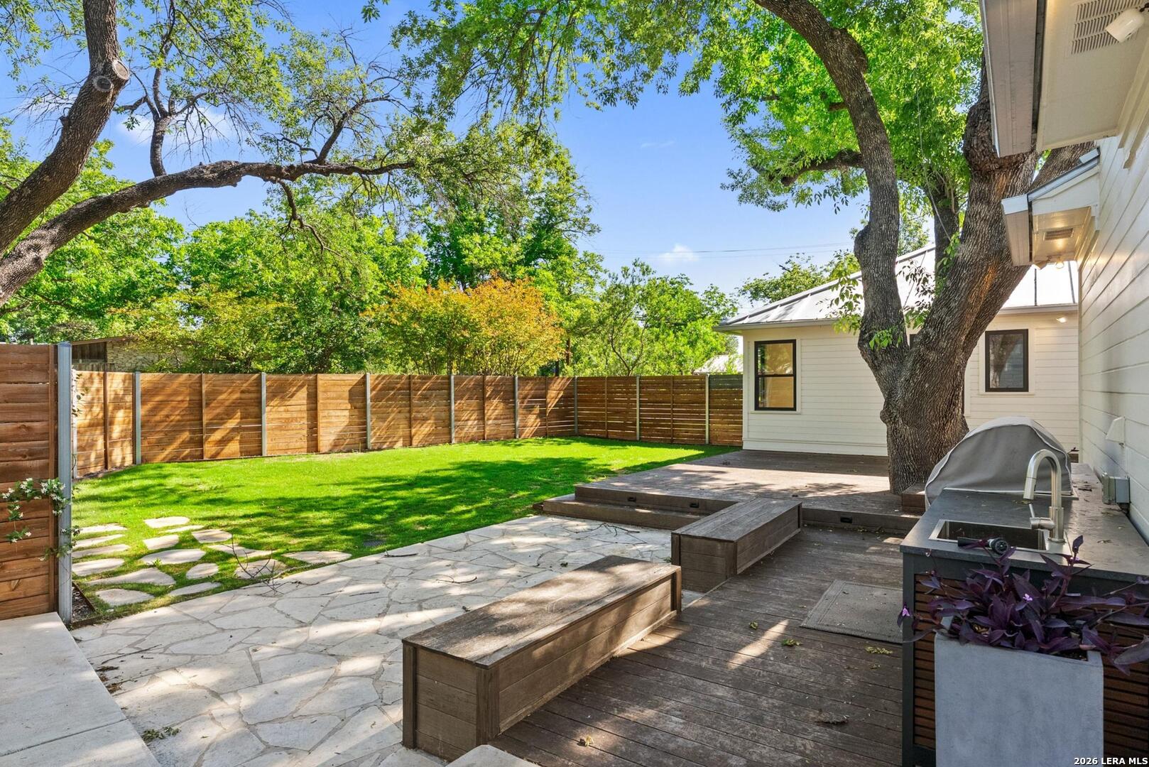 1402 Hutto Road Georgetown, TX 78626 - Photo 34 of 34 a view of backyard with outdoor seating and green space