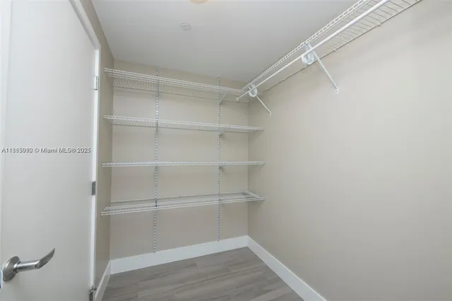 a view of a room with racks on the wall