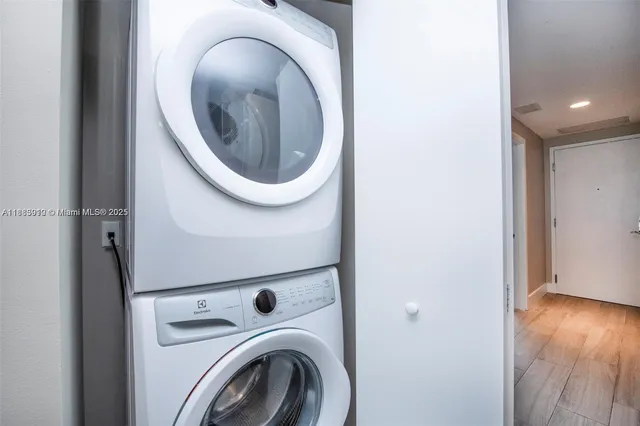a view of a swimming pool with outdoor seating
