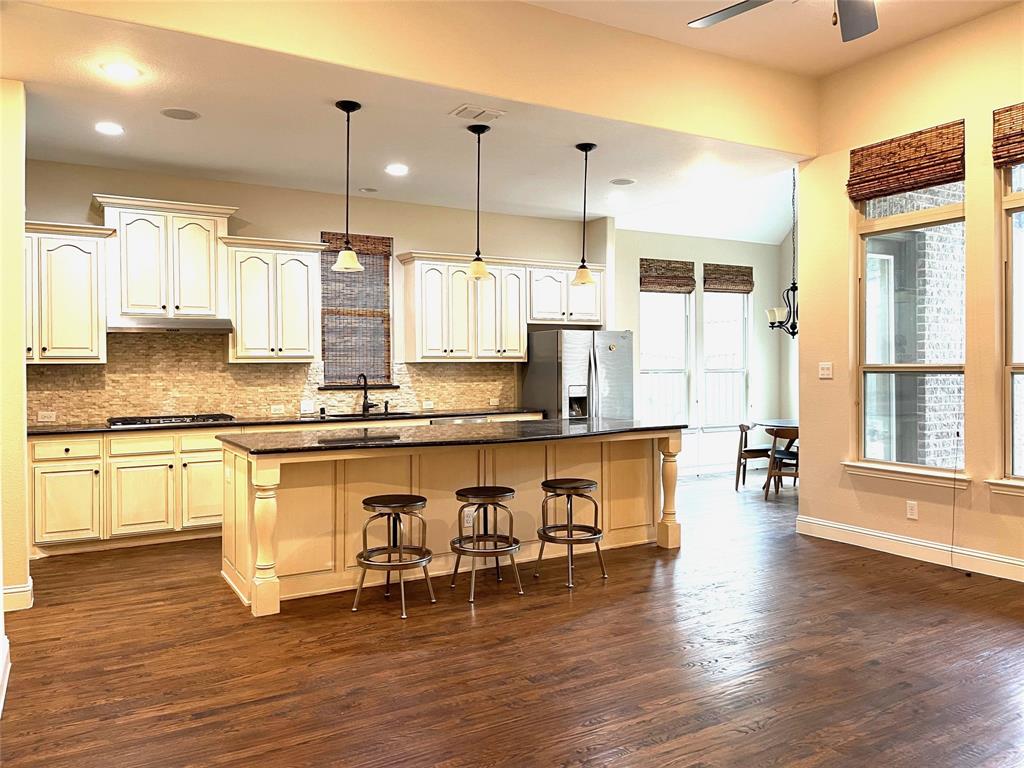 1840 Audubon Pond Way Allen, TX 75013 - Photo 17 of 38 a large kitchen with lots of counter space and a sink