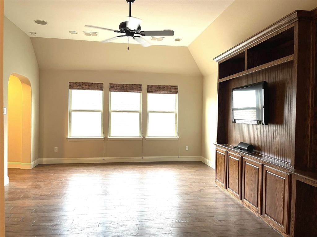 1840 Audubon Pond Way Allen, TX 75013 - Photo 28 of 38 a view of an empty room with window and wooden floor