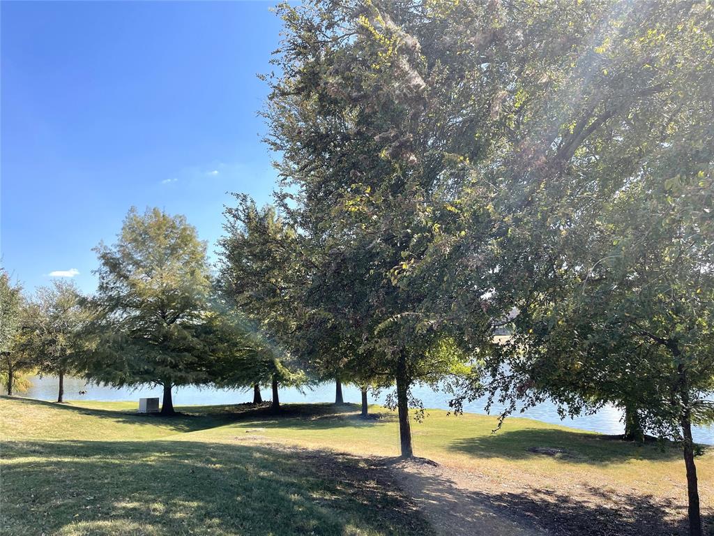 1840 Audubon Pond Way Allen, TX 75013 - Photo 38 of 38 a view of a swimming pool with an outdoor space and seating area