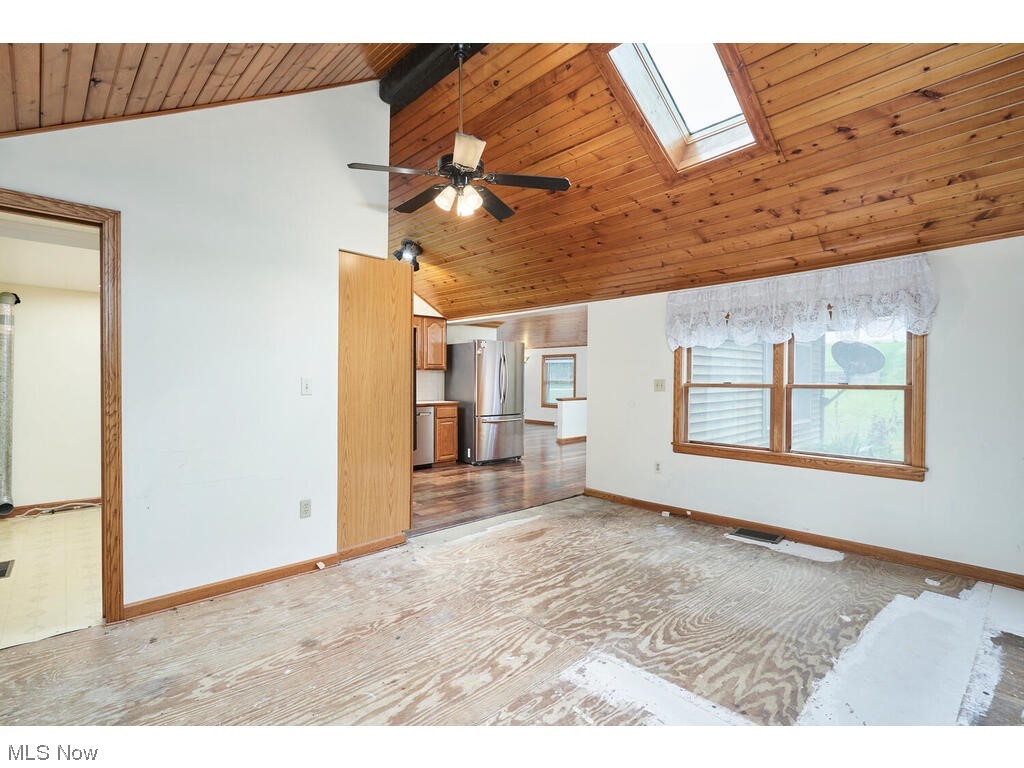 458 Keltner Road Akron, OH 44319 - Photo 9 of 22 dining/sitting room w/ plywood flooring
