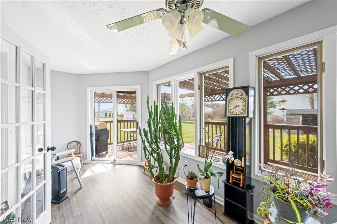 5352 Jaycox Road North Ridgeville, OH 44039 - Photo 14 of 27 Sunroom / solarium with a ton of natural light, french doors, and ceiling fan