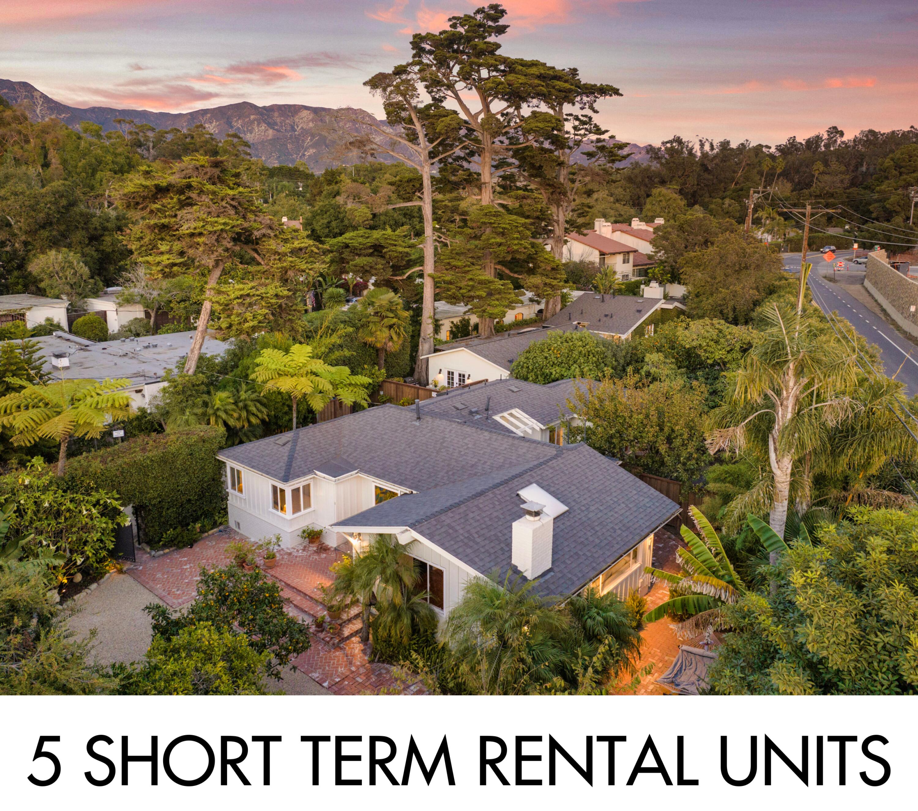 an aerial view of residential house with an outdoor space