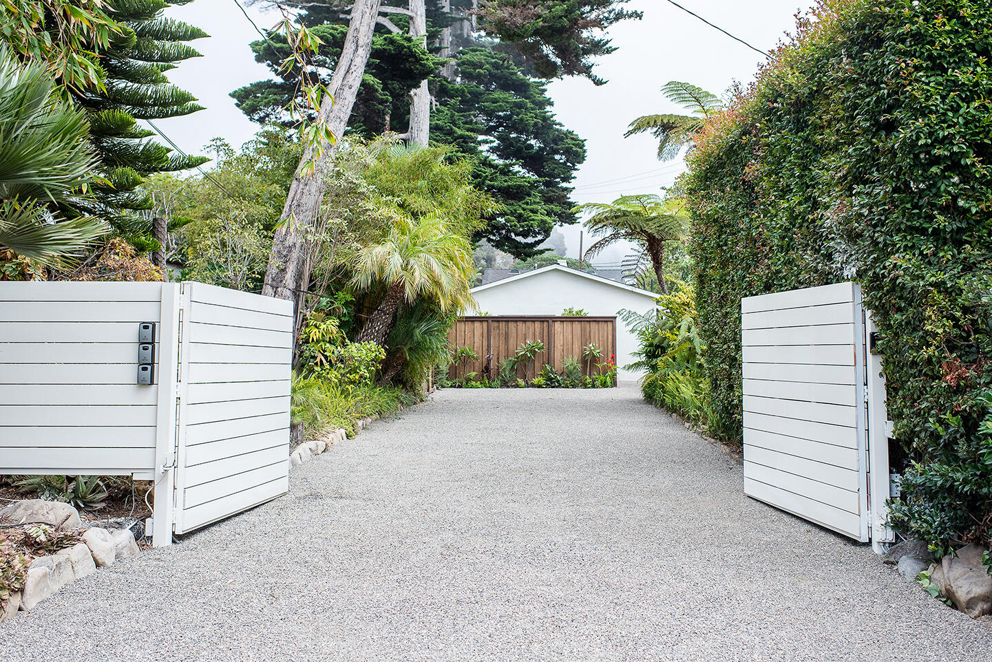 126 Loureyro Road Montecito, CA 93108 - Photo 24 of 46 a view of a house with a yard and garage