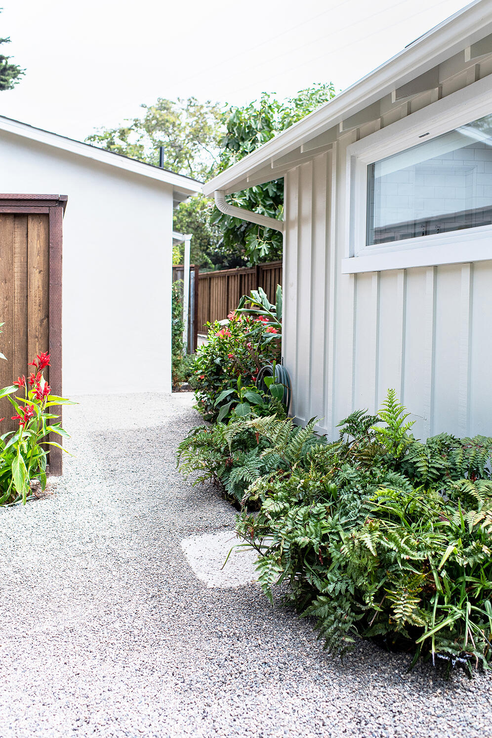 126 Loureyro Road Montecito, CA 93108 - Photo 25 of 46 a backyard of a house with flower plants