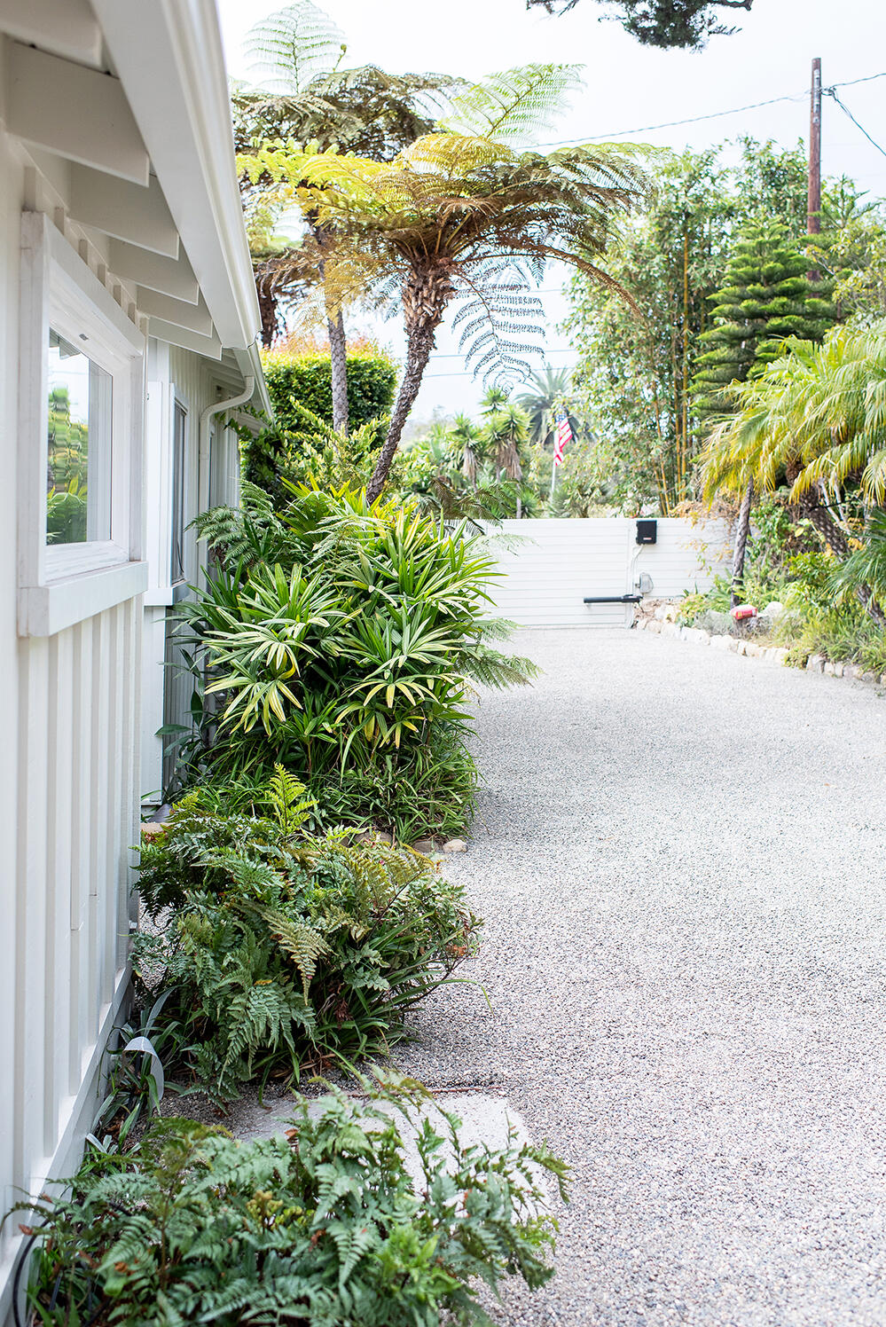 126 Loureyro Road Montecito, CA 93108 - Photo 26 of 46 a view of a garden with lawn chairs