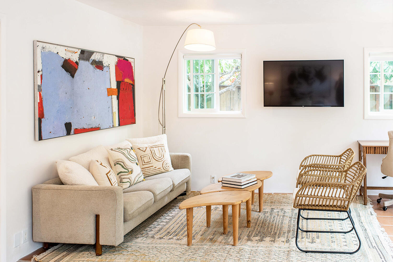 126 Loureyro Road Montecito, CA 93108 - Photo 33 of 46 a living room with furniture and a flat screen tv