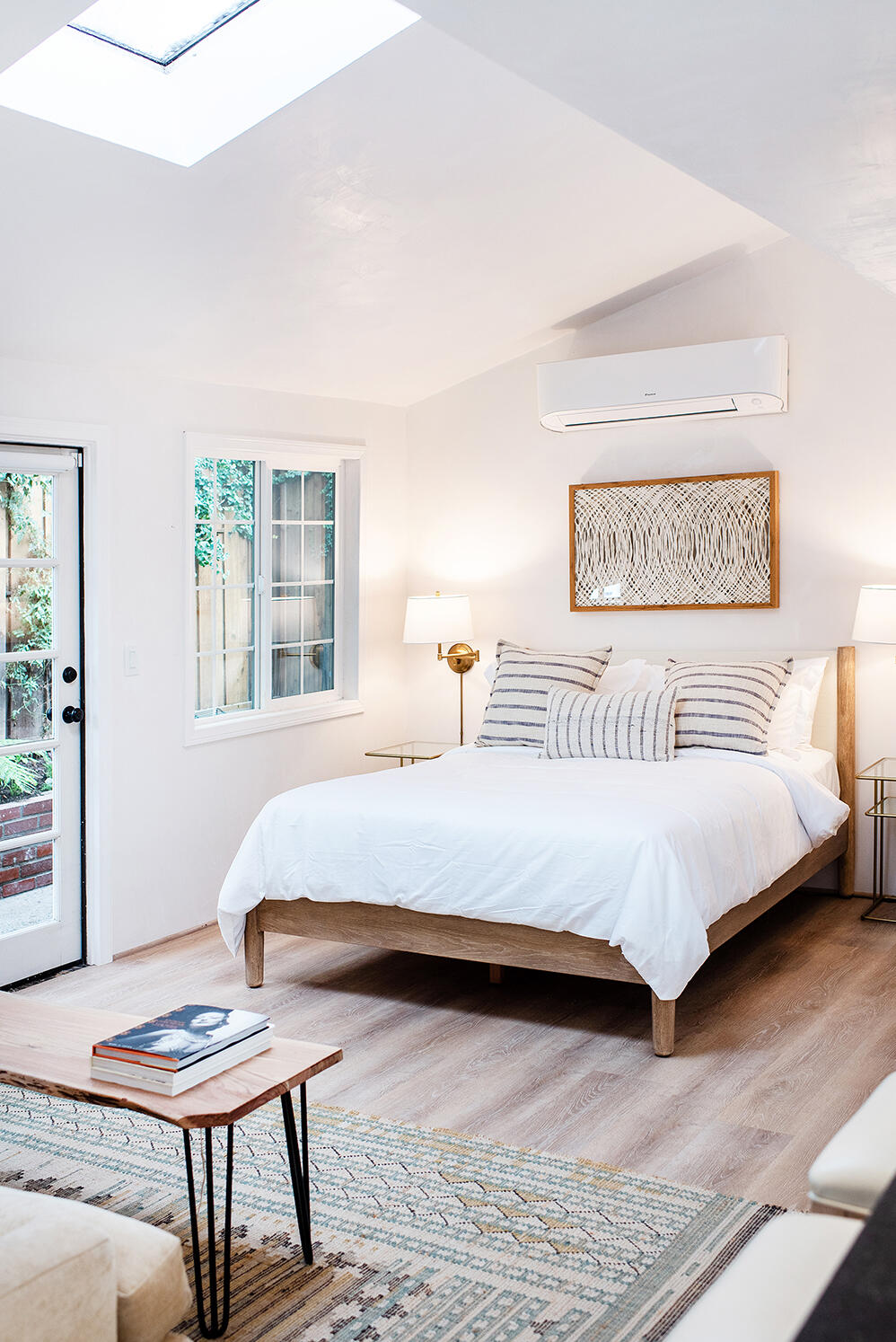 126 Loureyro Road Montecito, CA 93108 - Photo 35 of 46 a bedroom with a bed a table and chair