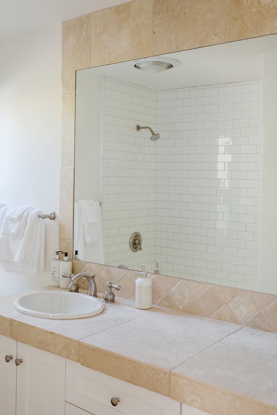 126 Loureyro Road Montecito, CA 93108 - Photo 44 of 46 a bathroom with a sink and a mirror