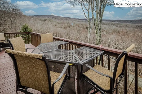 a view of balcony with furniture and stove