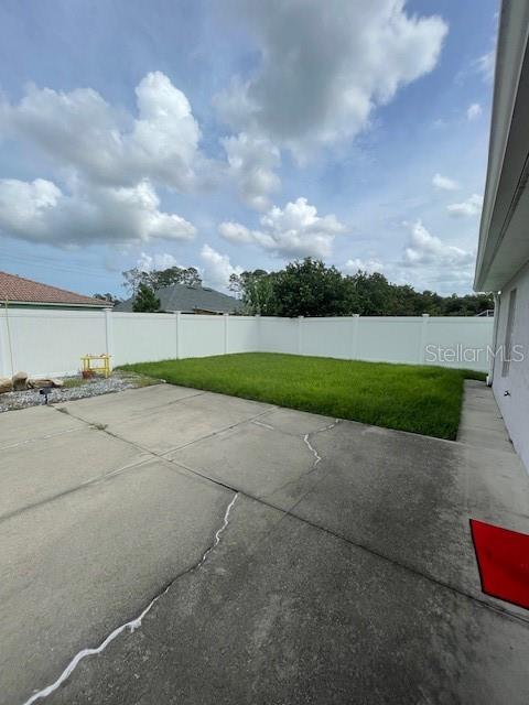 23 Ridley Lane, Unit B Palm Coast, FL 32164 - Photo 16 of 17 a view of swimming pool with a yard