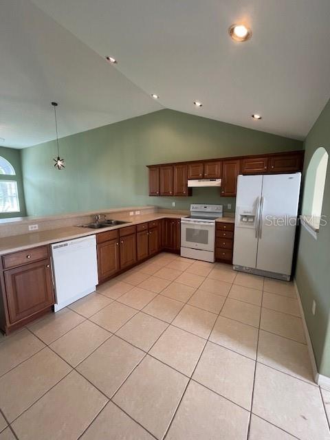 23 Ridley Lane, Unit B Palm Coast, FL 32164 - Photo 7 of 17 a large kitchen with a cabinets and stainless steel appliances