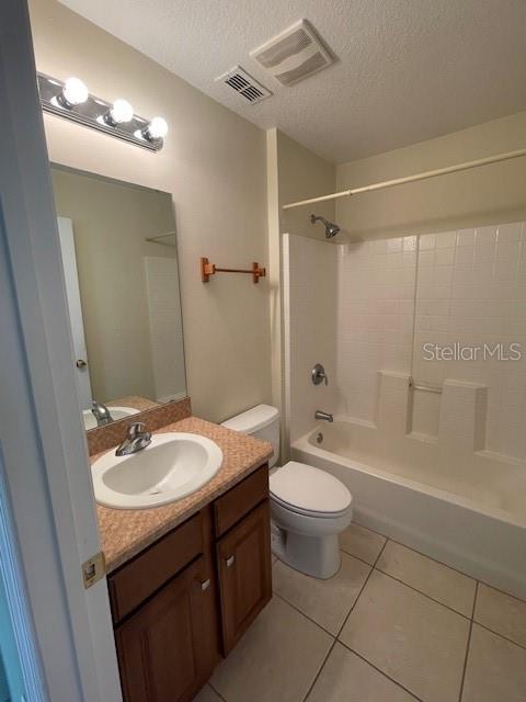 23 Ridley Lane, Unit B Palm Coast, FL 32164 - Photo 9 of 17 a bathroom with a sink a toilet and shower
