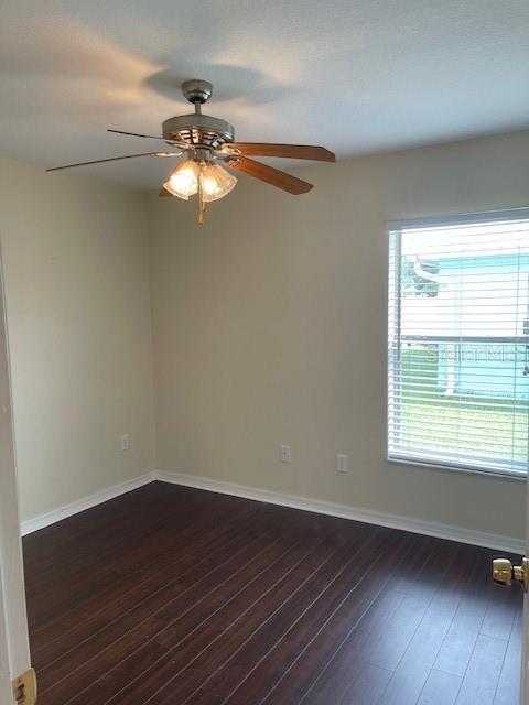 23 Ridley Lane, Unit B Palm Coast, FL 32164 - Photo 10 of 17 a very nice looking room with wooden floor and windows