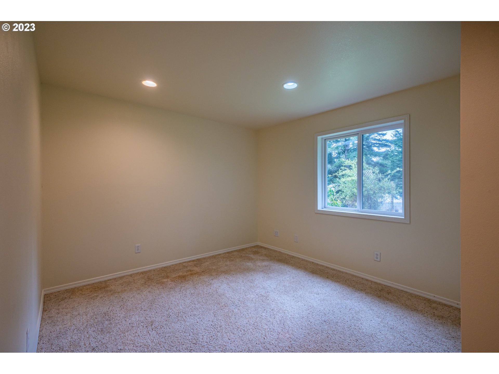 87763 Two Mile Lane Bandon, OR 97411 - Photo 22 of 41 an empty room with windows