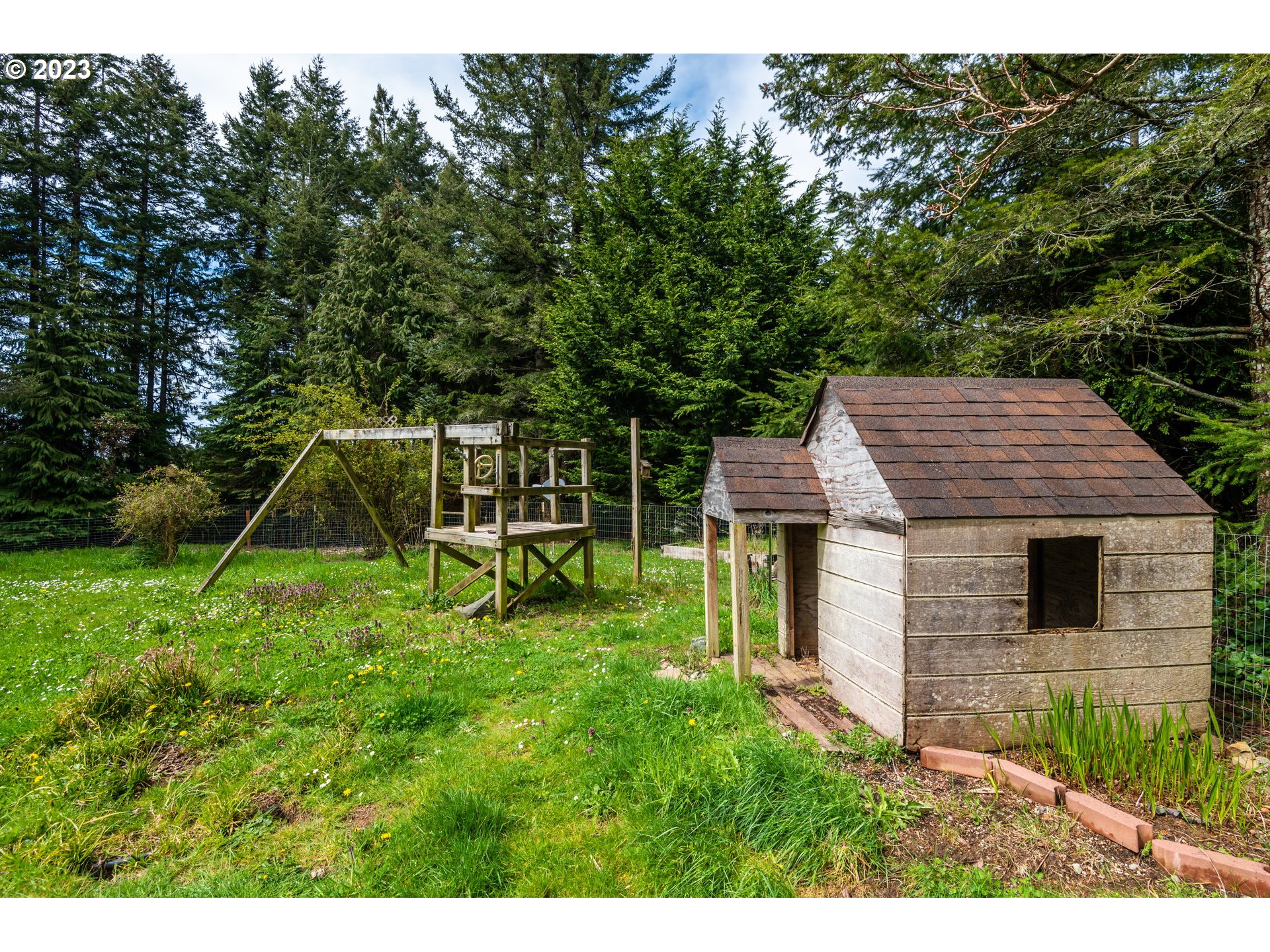 87763 Two Mile Lane Bandon, OR 97411 - Photo 38 of 41 a view of a house with backyard