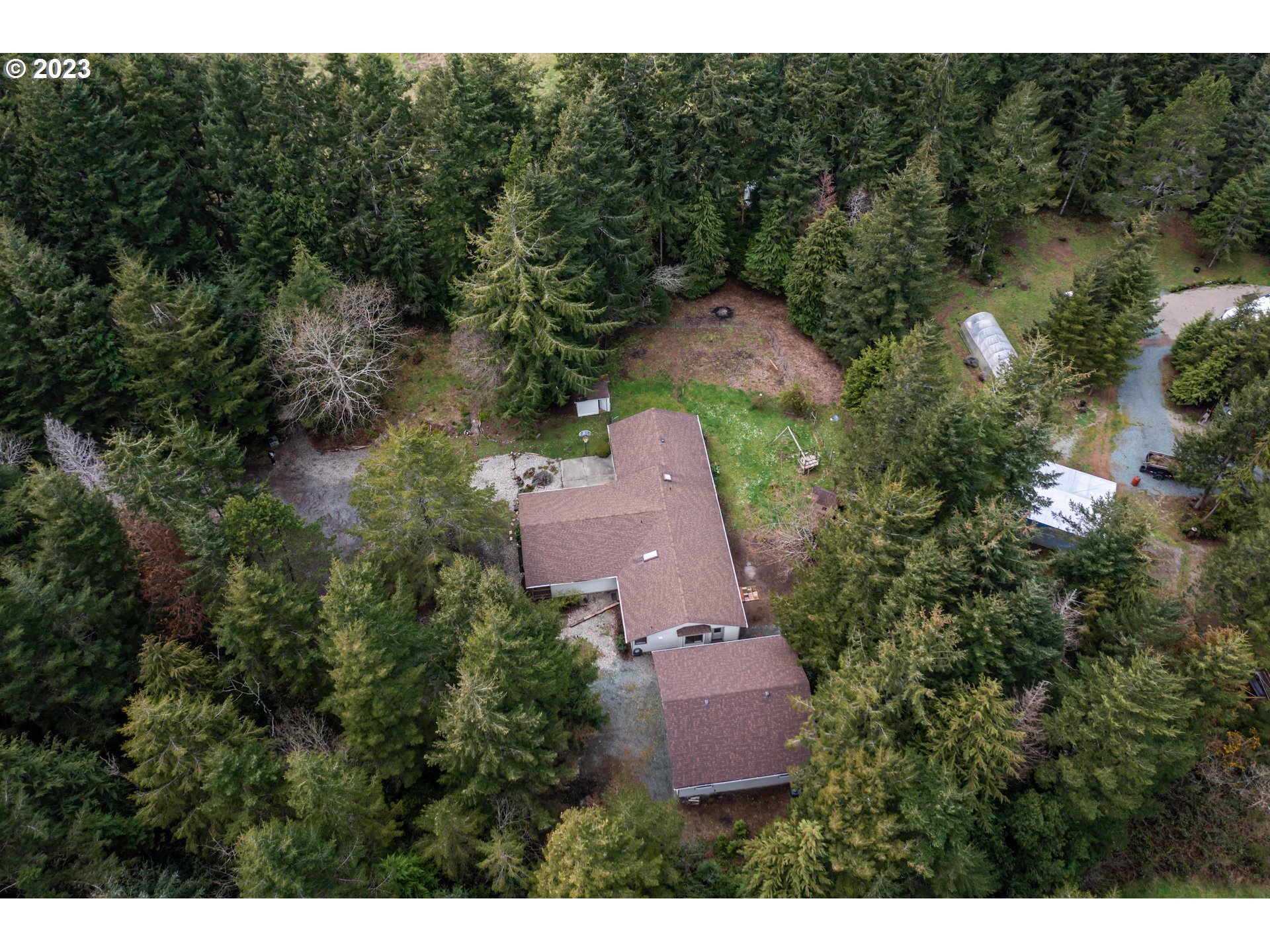 87763 Two Mile Lane Bandon, OR 97411 - Photo 40 of 41 a view of a house with a yard