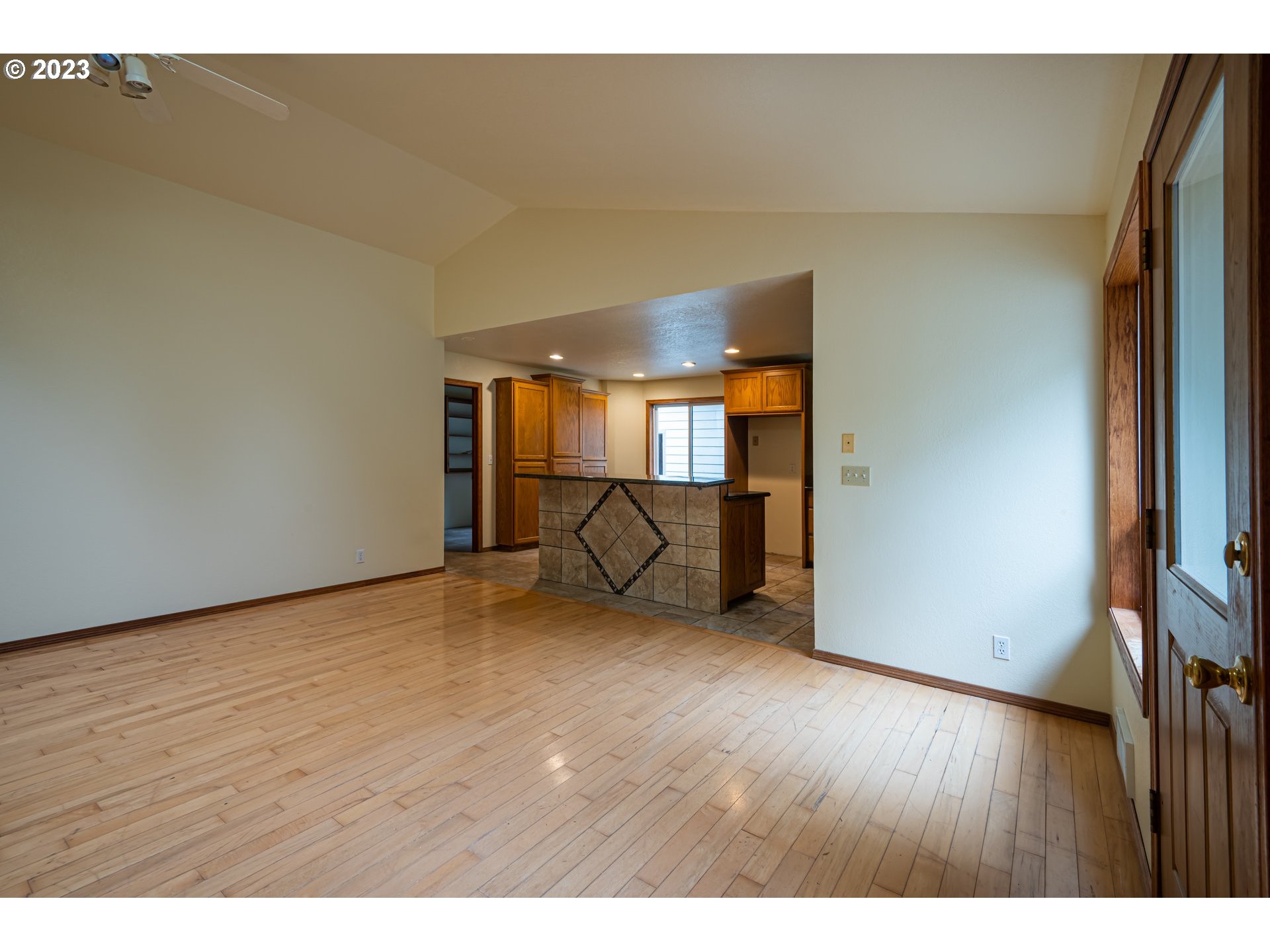 87763 Two Mile Lane Bandon, OR 97411 - Photo 10 of 41 a view of an empty room and wooden floor