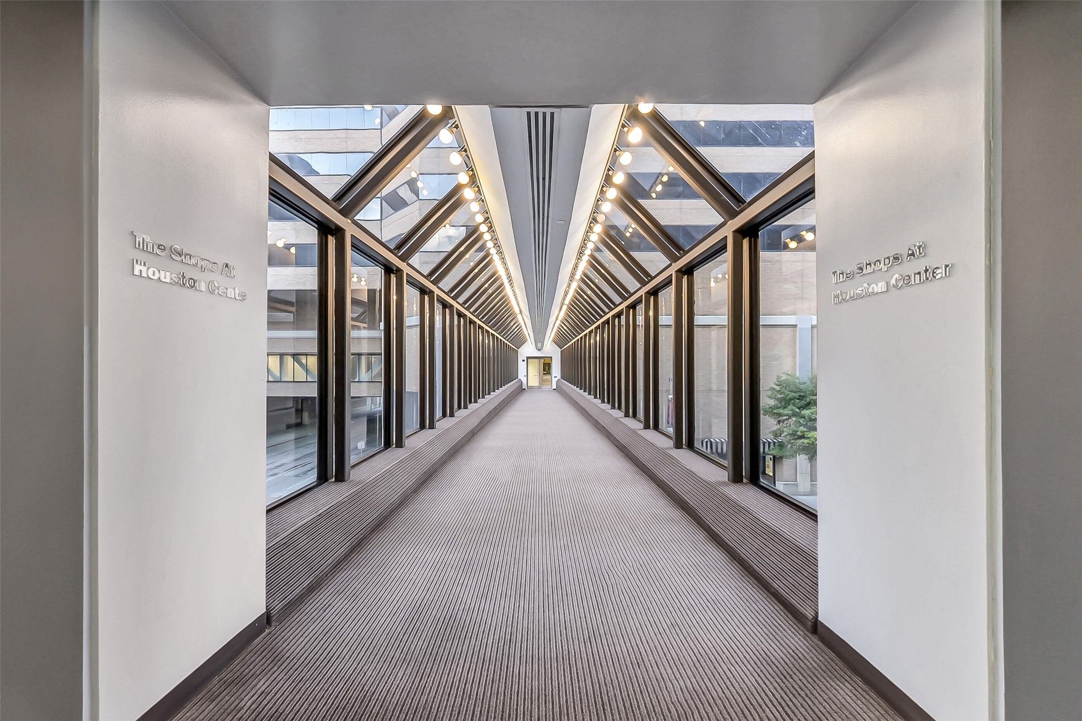 1111 Caroline Street, Unit 2903 Houston, TX 77010 - Photo 22 of 27 Enjoy convenient proximity to high-end shopping and dinning. This elegant glass walkway connects the Four Seasons directly to The Shops at Houston Center.