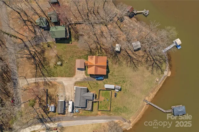 a view of a yard with an outdoor seating