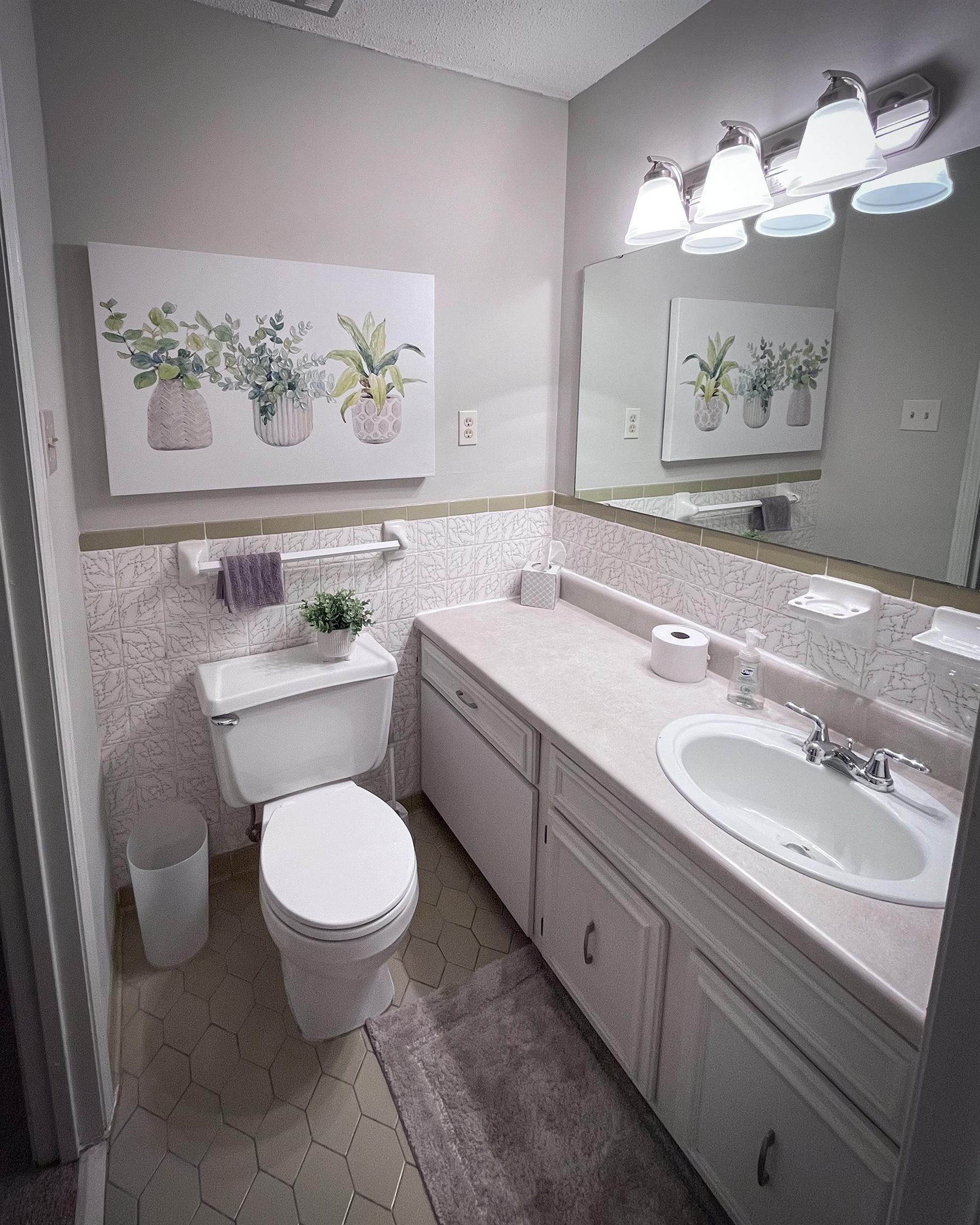 6410 Macon Road Memphis, TN 38134 - Photo 6 of 13 a bathroom with a toilet sink and mirror