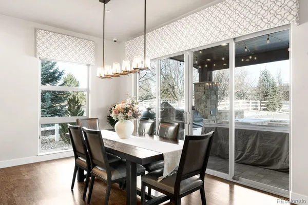 a kitchen with stainless steel appliances granite countertop a refrigerator and a stove