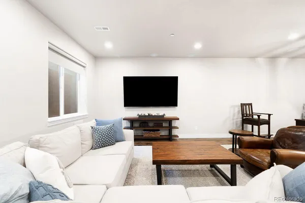 a view of a living room and dining room
