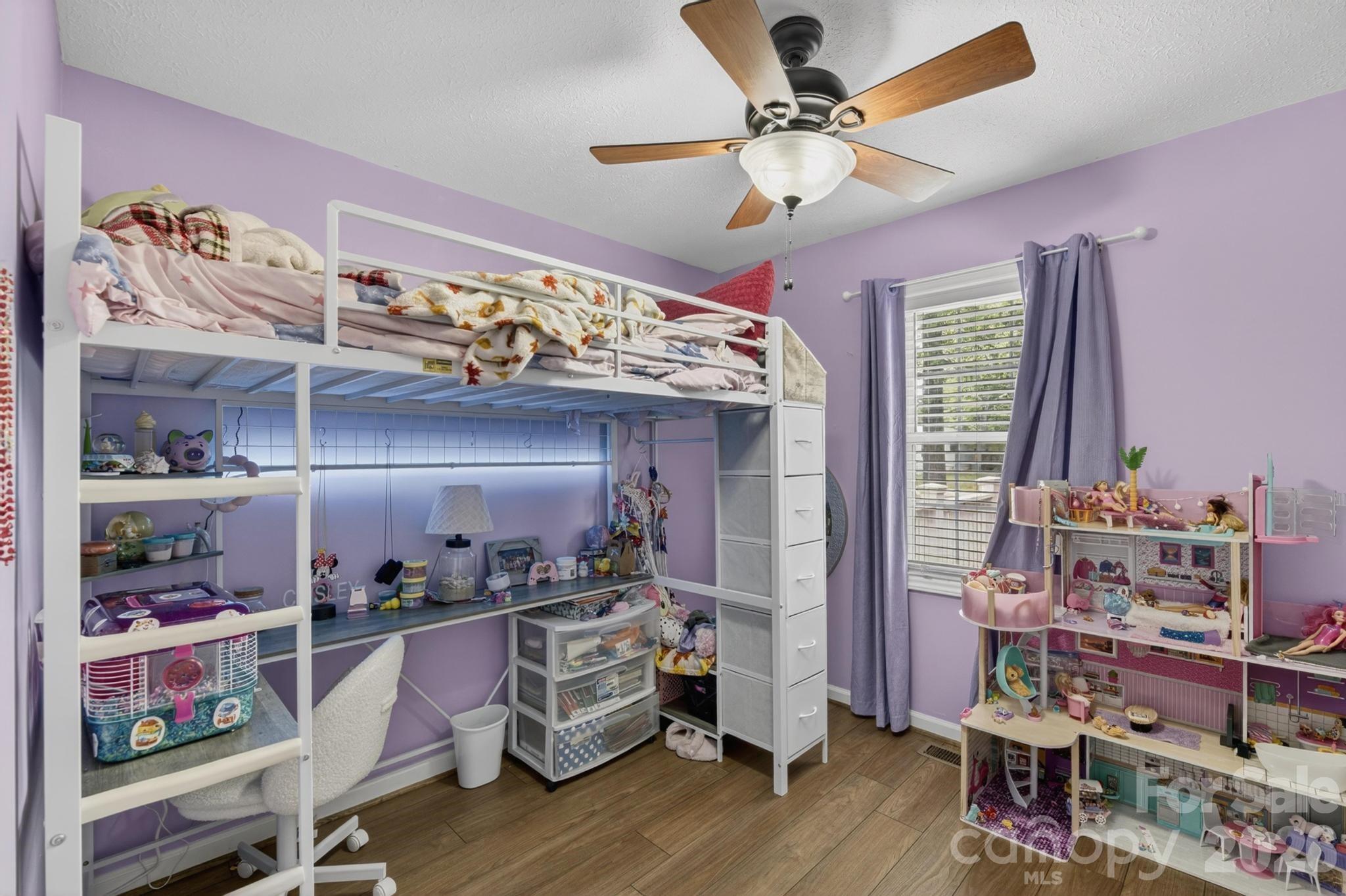 2308 Walt Arney Road Lenoir, NC 28645 - Photo 19 of 37 a view of a room with racks and wooden floor