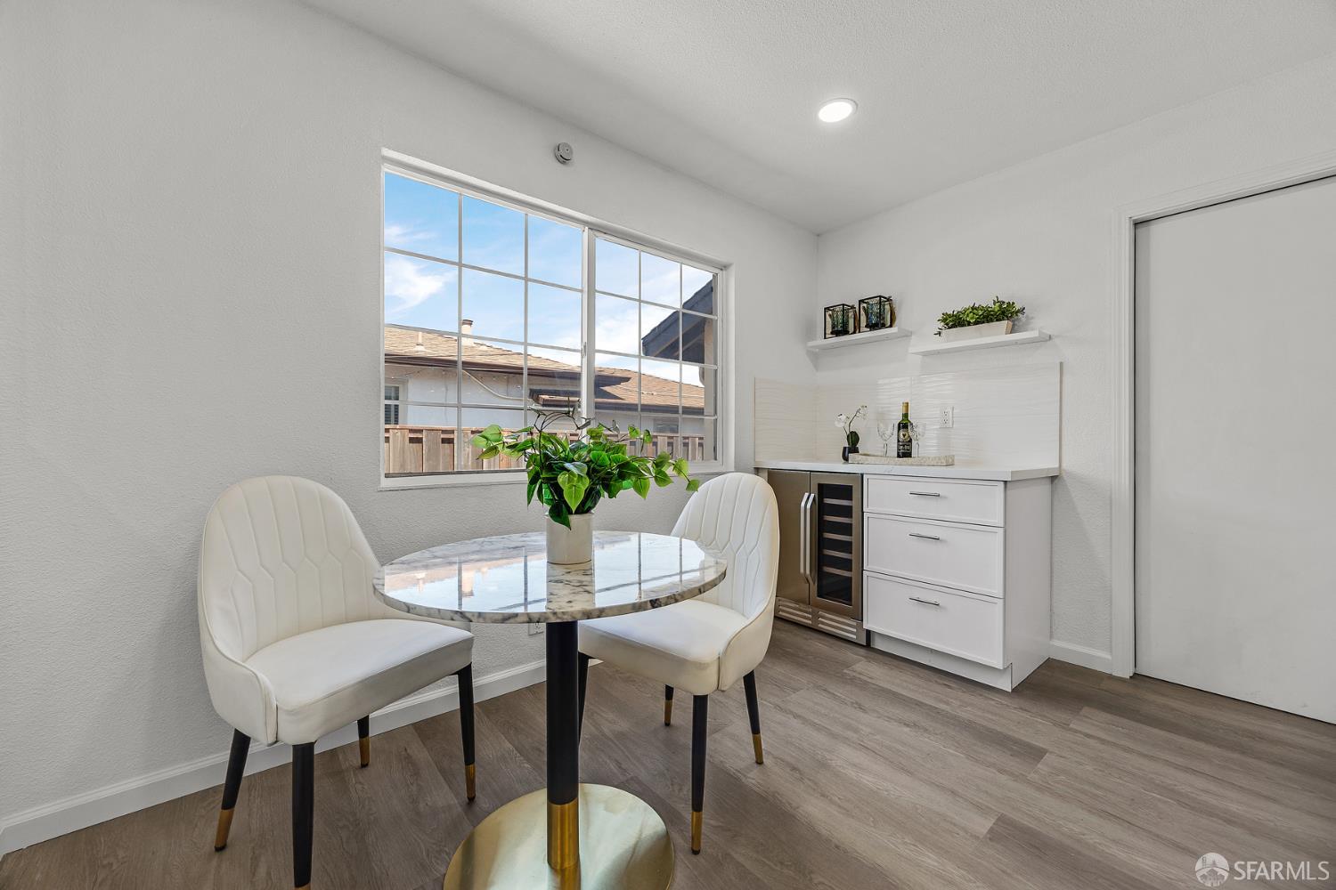 3138 Flannery Road San Pablo, CA 94806 - Photo 11 of 38 a dining room with furniture and wooden floor