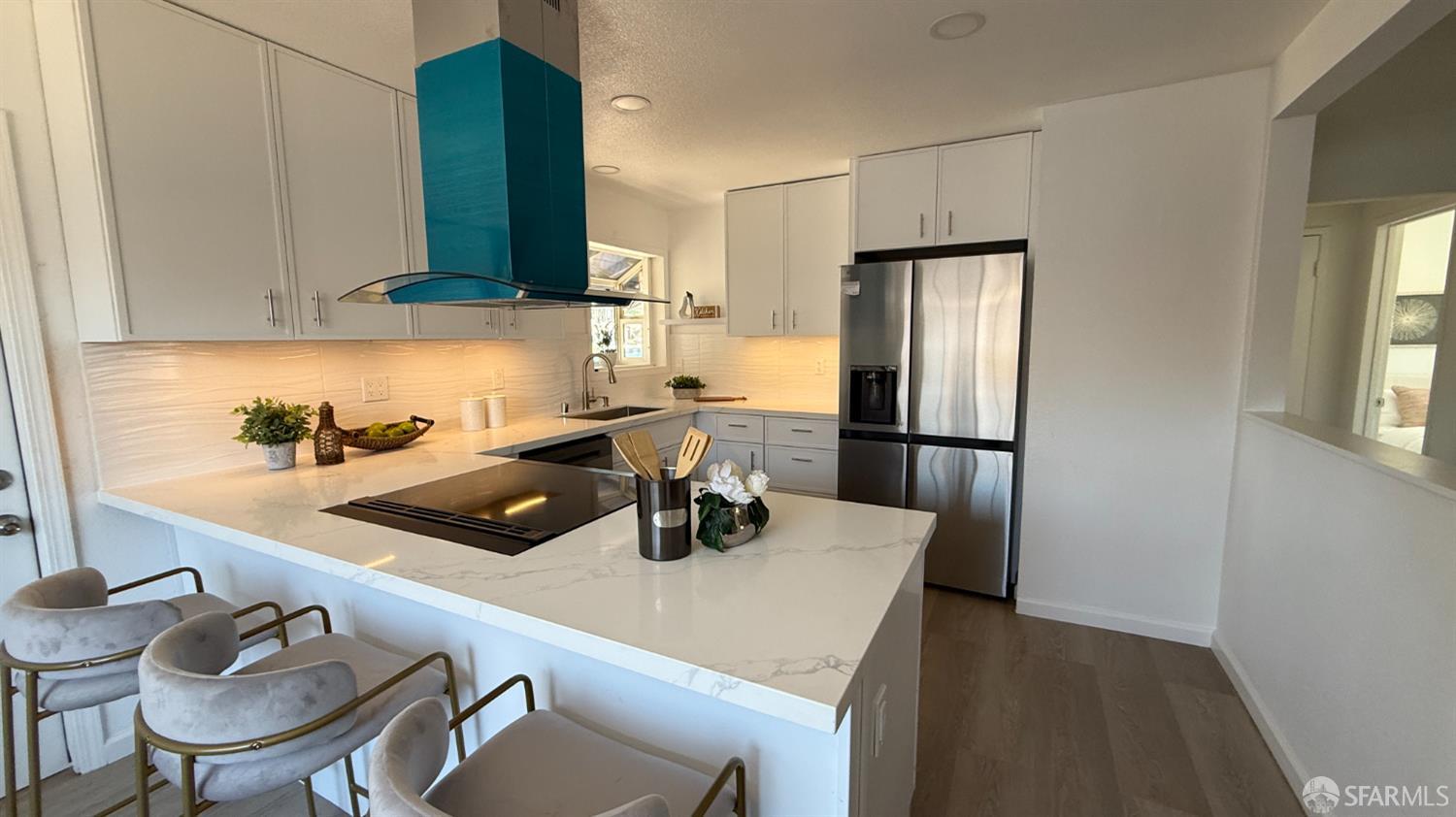 3138 Flannery Road San Pablo, CA 94806 - Photo 13 of 38 a kitchen with a sink a stove and chairs