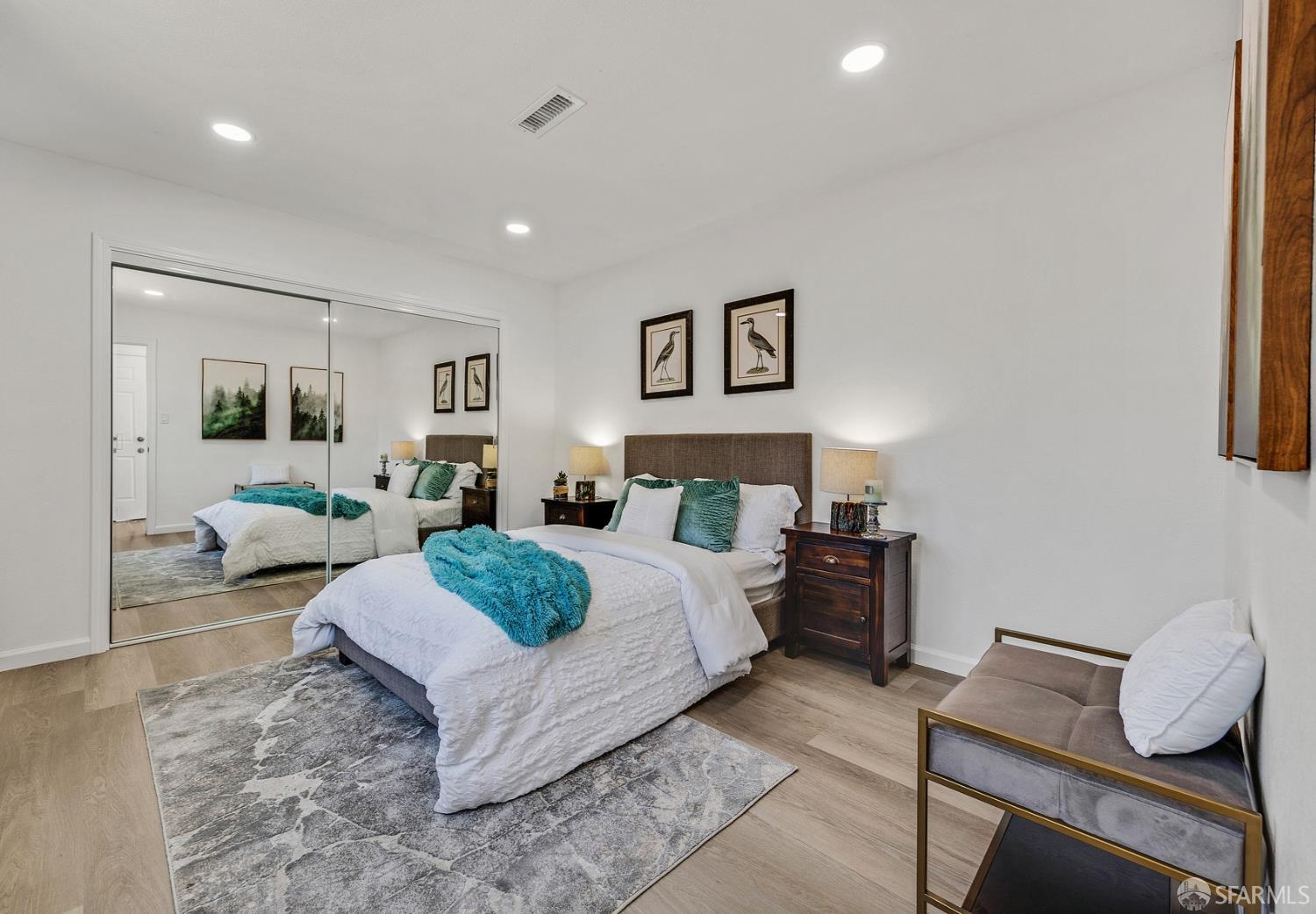3138 Flannery Road San Pablo, CA 94806 - Photo 22 of 38 a spacious bedroom with a bed and furniture