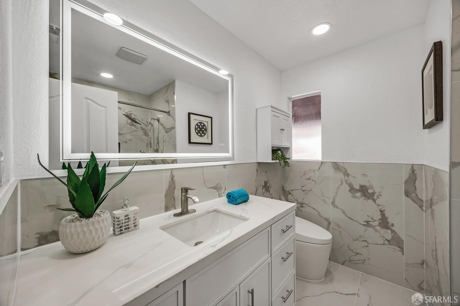 3138 Flannery Road San Pablo, CA 94806 - Photo 23 of 38 a bathroom with a potted plant and a sink