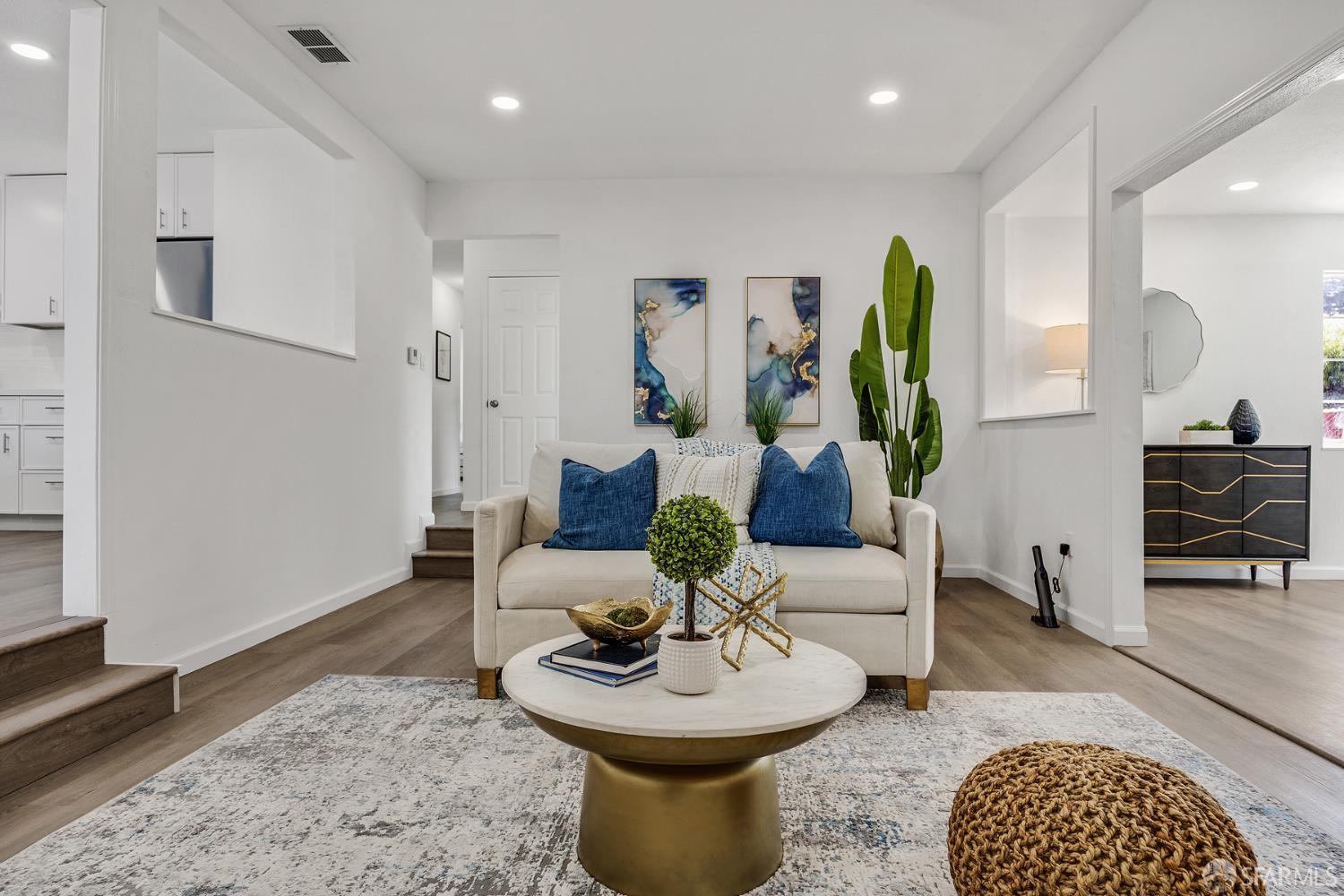 3138 Flannery Road San Pablo, CA 94806 - Photo 3 of 38 a living room with furniture a rug and a chandelier